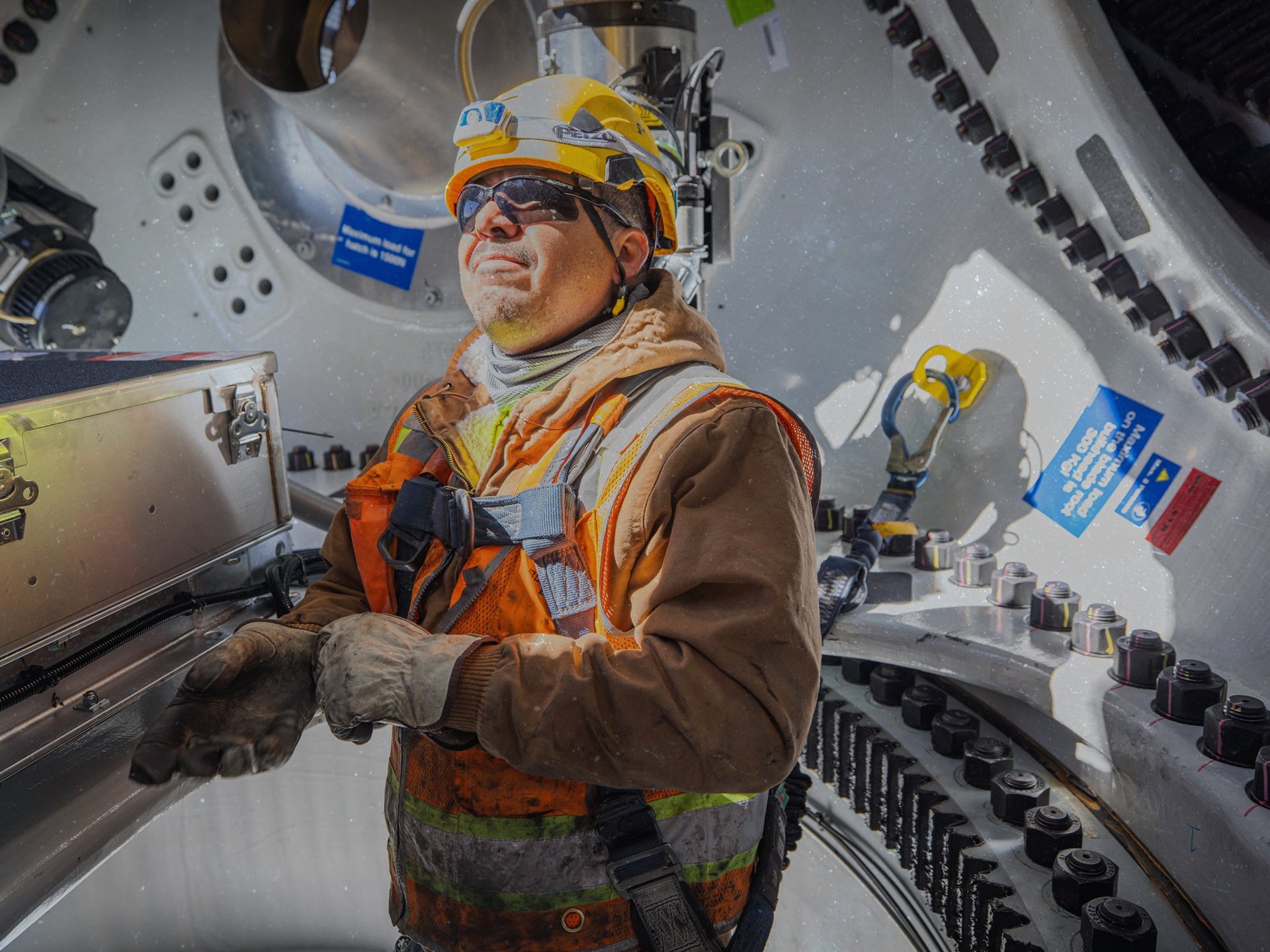View of worker inside wind turbine