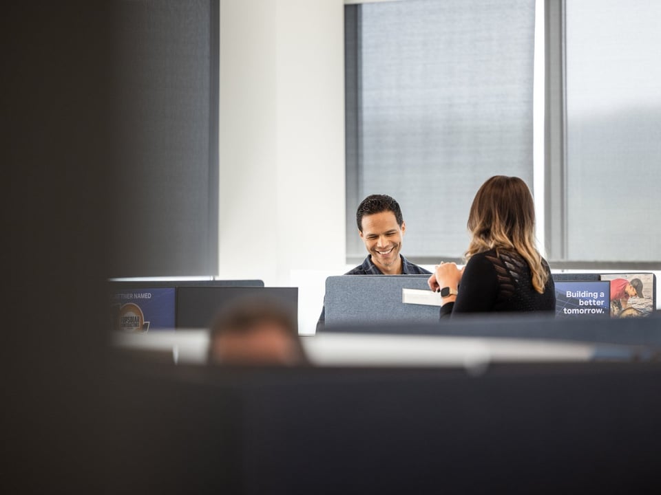 Two employees working in the corporate office