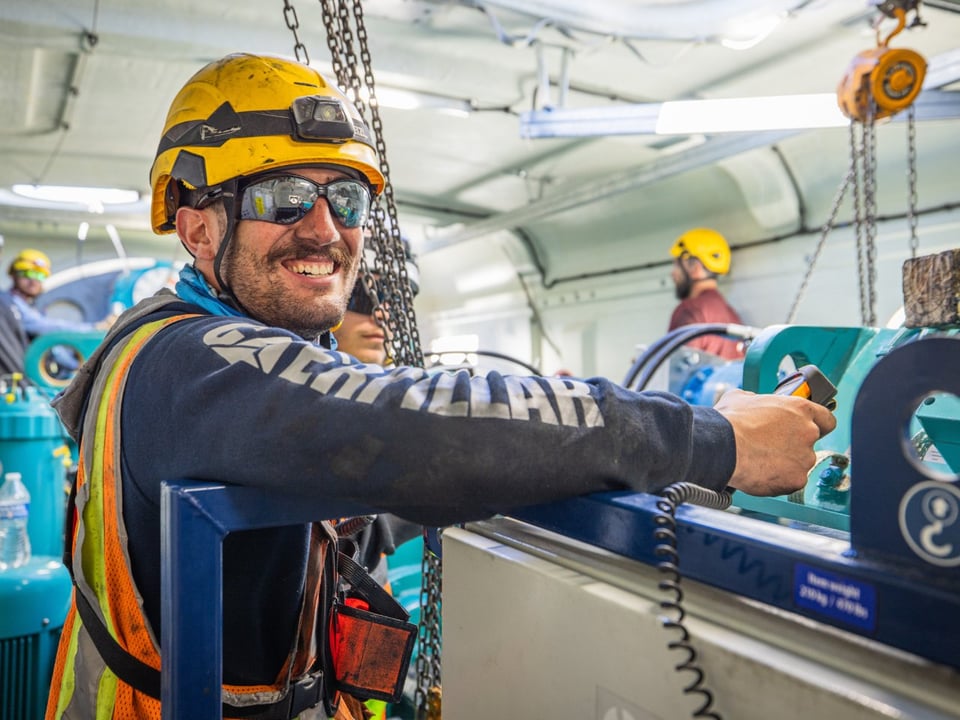 Worker inside the nacelle of the wind turbine