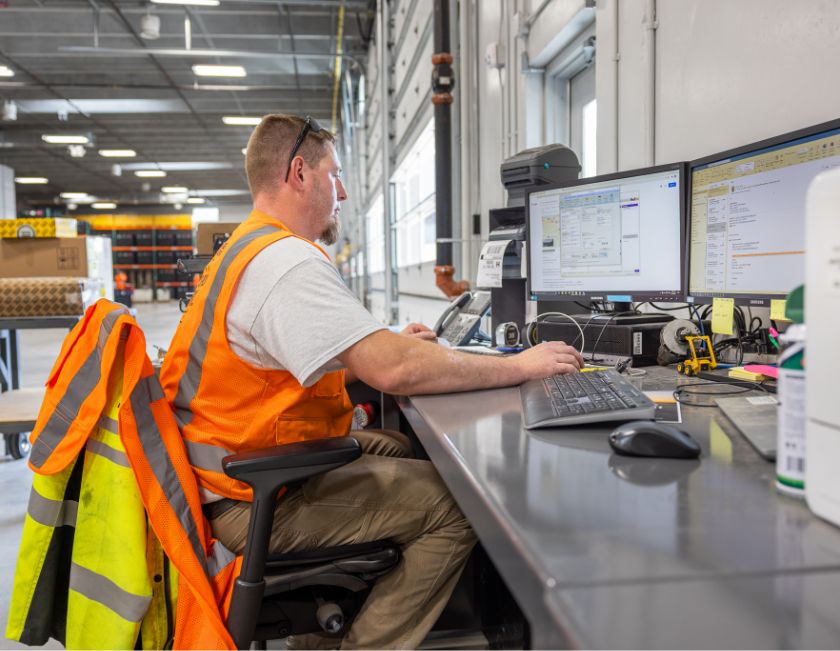 man working at computer